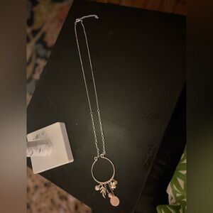 Beautiful long strand charm pendant necklace.